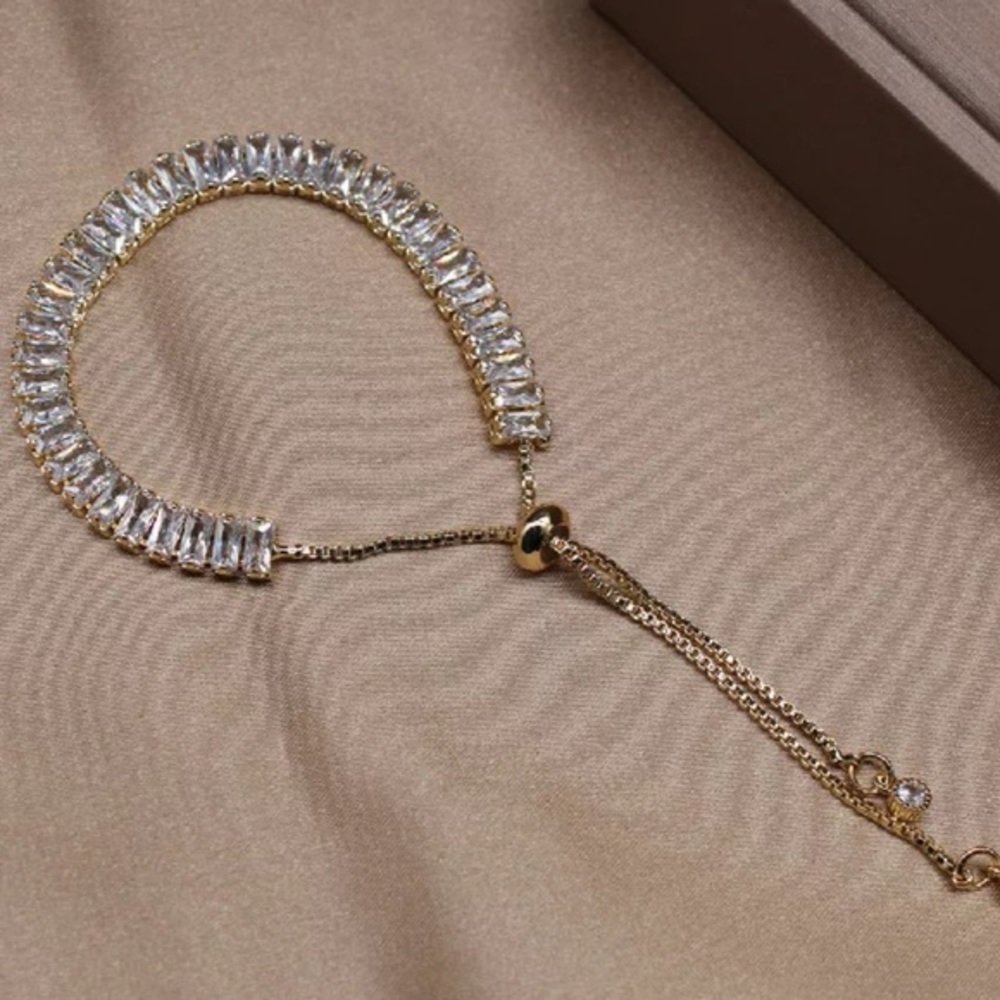 New adjustable golden/silver tone cubic zirconia bracelet